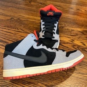 Nike | 2011 Nike SB Dunk Mid Pro Un-Supreme Sneakers